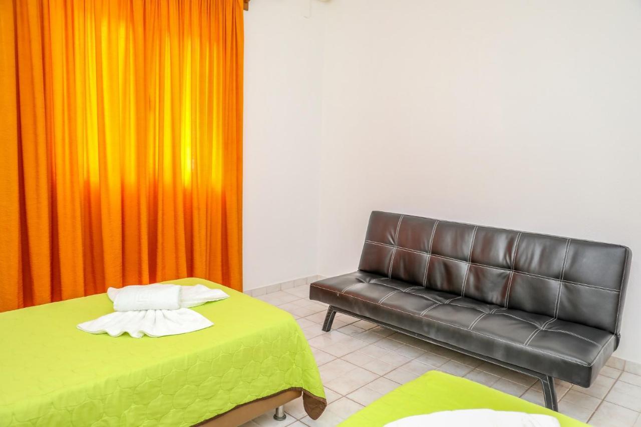 Villa Mitzelos Moni Evaggelistrias ภายนอก รูปภาพ