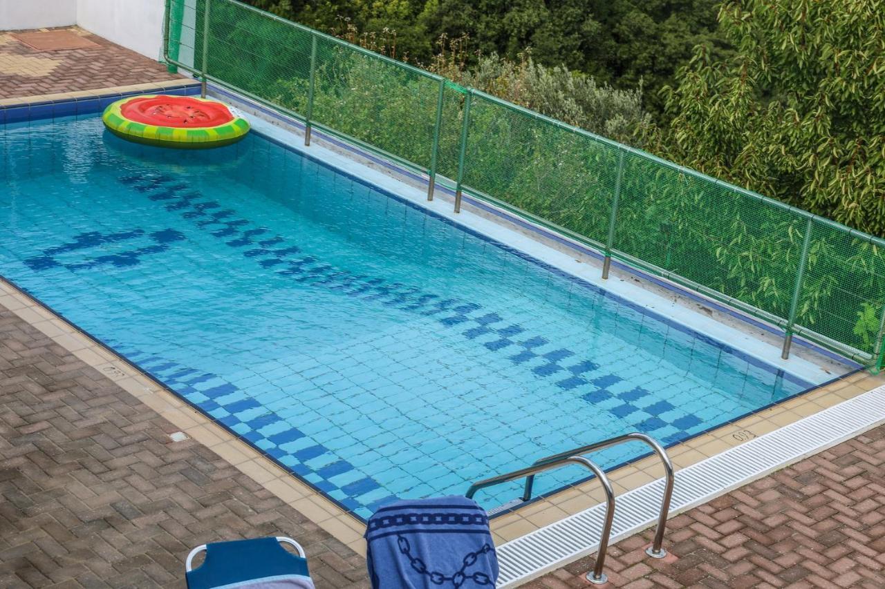 Villa Mitzelos Moni Evaggelistrias ภายนอก รูปภาพ