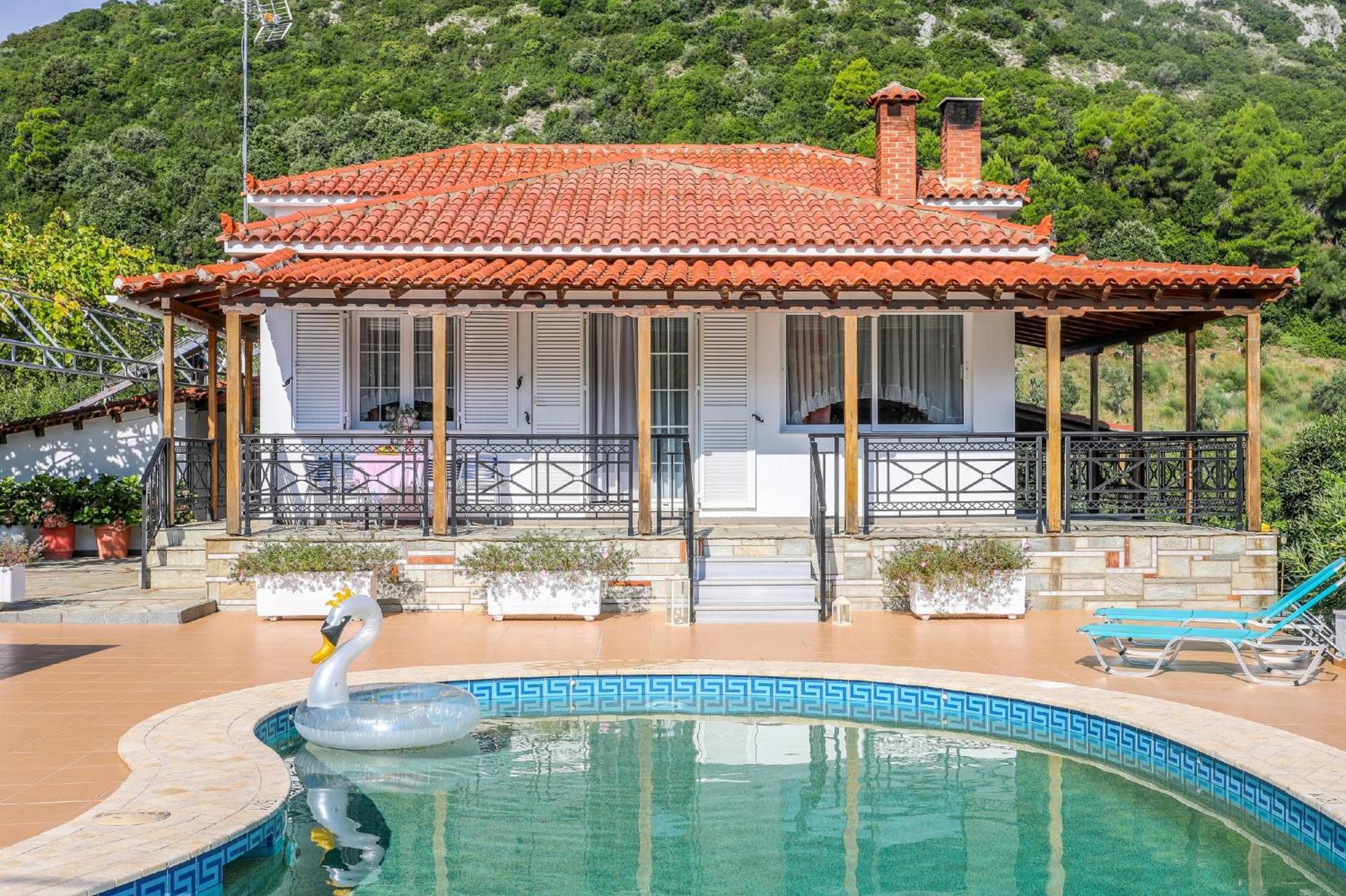 Villa Mitzelos Moni Evaggelistrias ภายนอก รูปภาพ